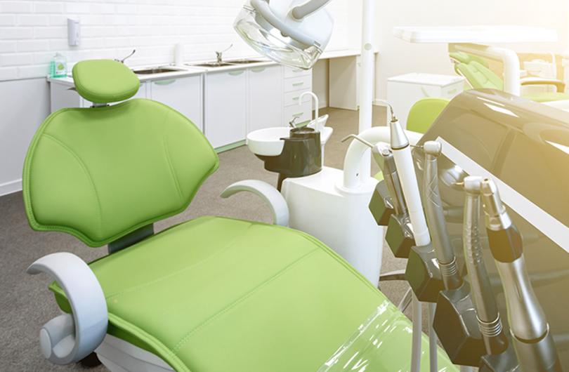 Operatory dental chair, against a green background