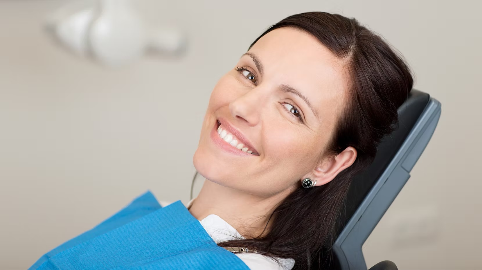 A woman in chair operatory