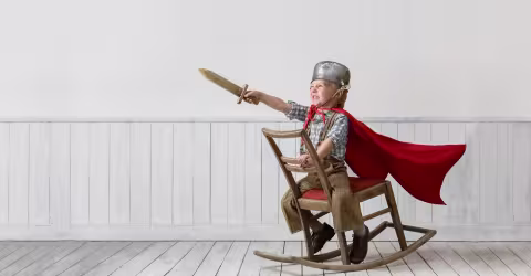 A boy superhero cape rocking chair
