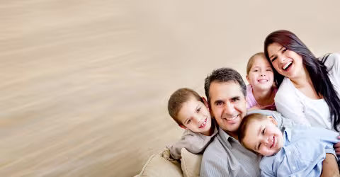 A family four motion blur, against a beige background